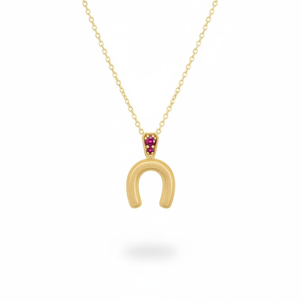 תליון פרסה מזהב עם אבני חן